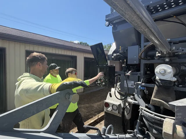 ConkCo crew operating the on-site concrete mixer